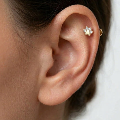 Titanový piercing 'Sparkling Paw'