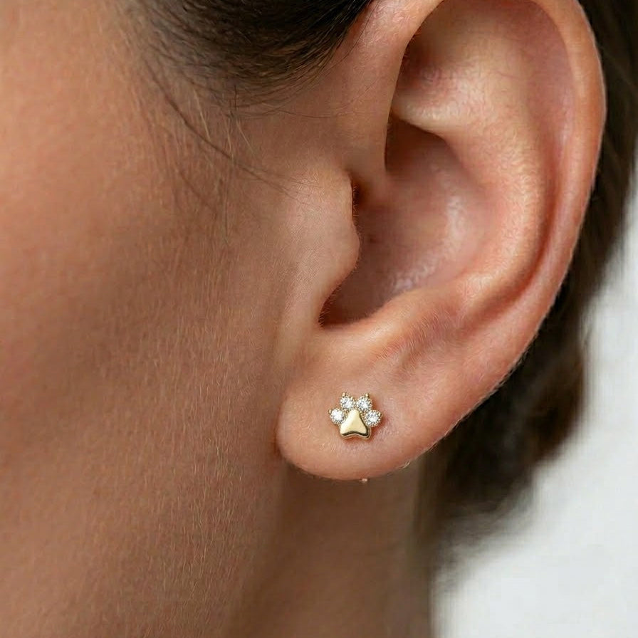 Titanový piercing 'Sparkling Paw'
